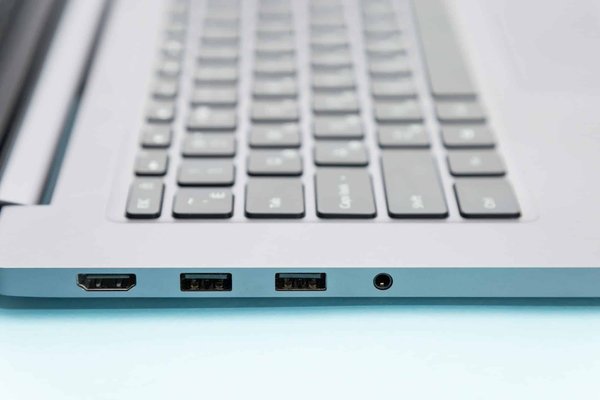 How to legally handle the transfer of intellectual property rights during a UK business acquisition?